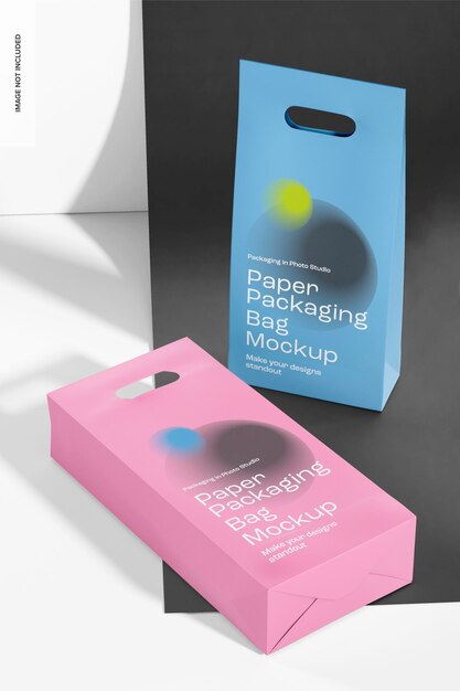 Paper packaging bags mockup, standing and dropped