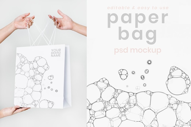 Mockup di shopping bag di carta psd con stampa creativa di bolle d'arte