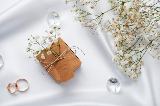 Paper wrapped wedding gift box with baby's breath flowers