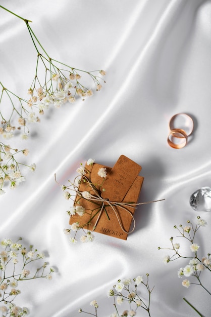 Paper wrapped wedding gift box with baby's breath flowers