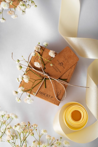 Paper wrapped wedding gift box with baby's breath flowers