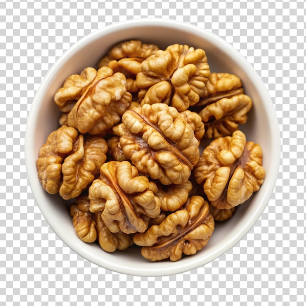 Peeled walnuts in white bowl isolated on transparent background