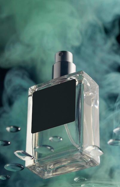 Perfume bottle and green smoke