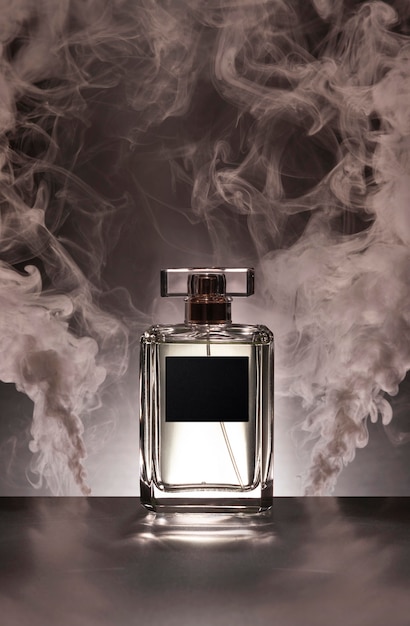 Perfume bottle and pink smoke