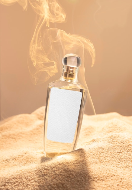 Perfume bottle and sand