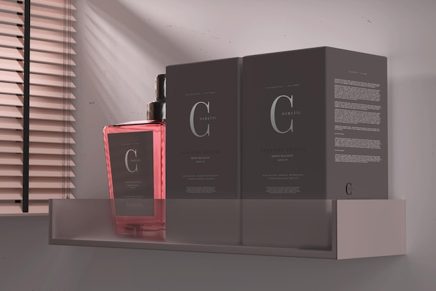 PSD bottiglia di profumo con scatola mockup