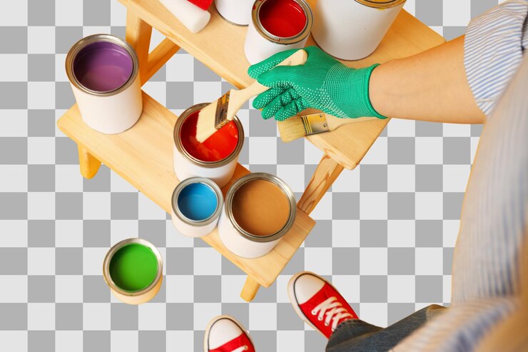 PSD a person applies a brush into vibrant paint cans isolated on white png