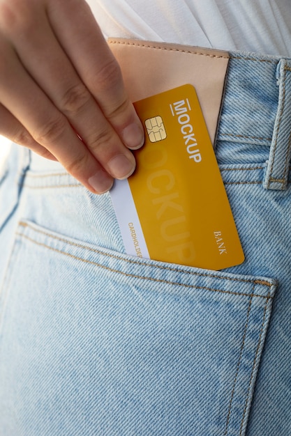 PSD person holding credit card mock-up in clothing pocket