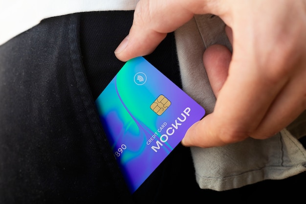 PSD person holding credit card mock-up in clothing pocket