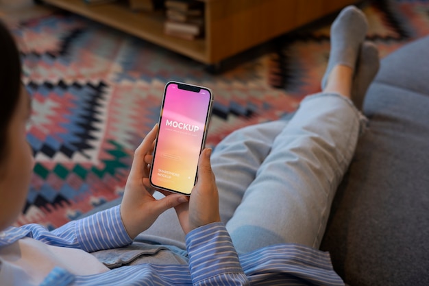 Person holding a device mockup