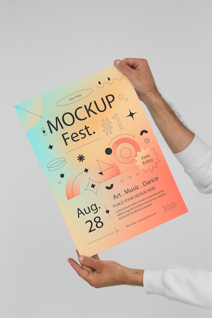 Person holding gradient poster mock-up for festival