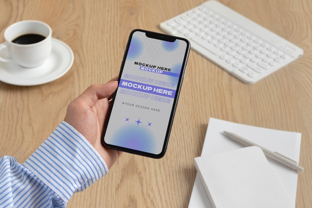 PSD person holding phone mockup