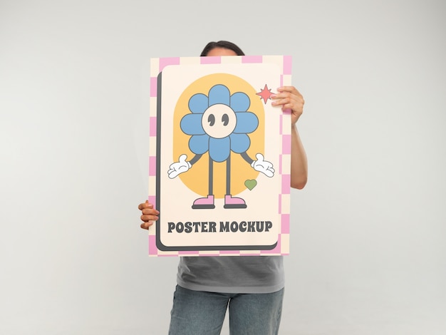 PSD person holding poster mockup