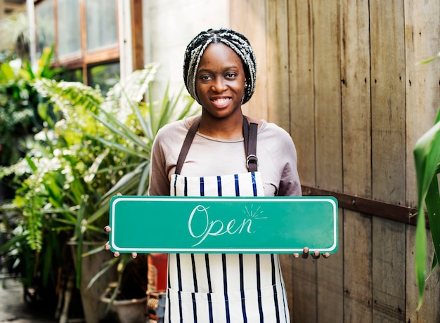 A person holding an sign