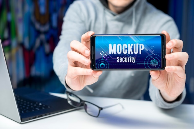 PSD person holding a smartphone digital security mock-up