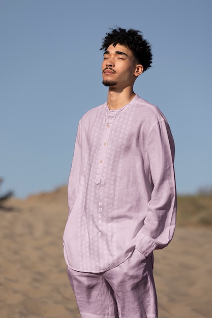 Person modeling eco clothing on the beach