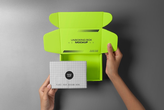 PSD person opening a paper box mock-up