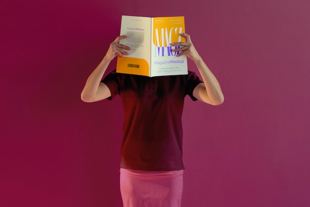 person reading color pop magazine with cover mockup