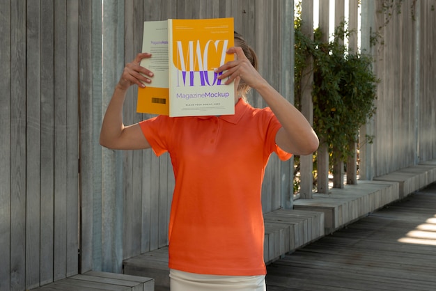 person reading color pop magazine with cover mockup
