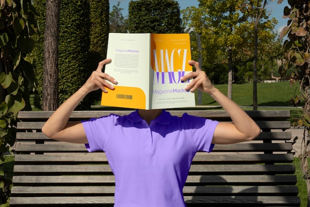 Person reading color pop magazine with cover mockup