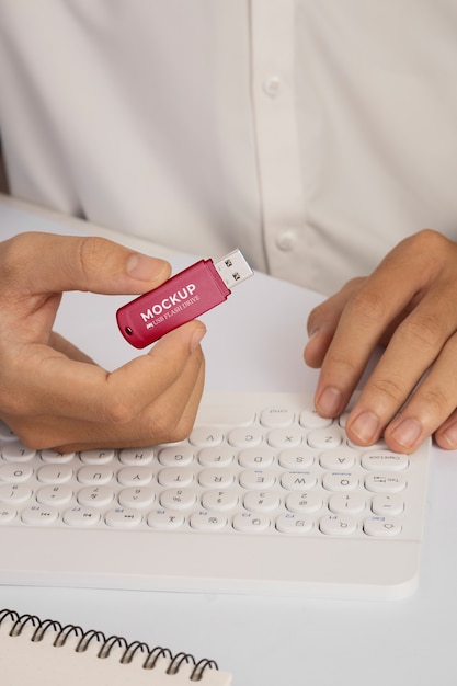 Person's hands holding usb memory stick