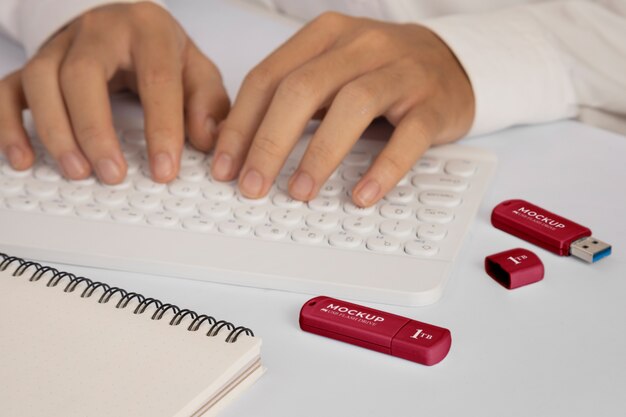 PSD person's hands holding usb memory stick