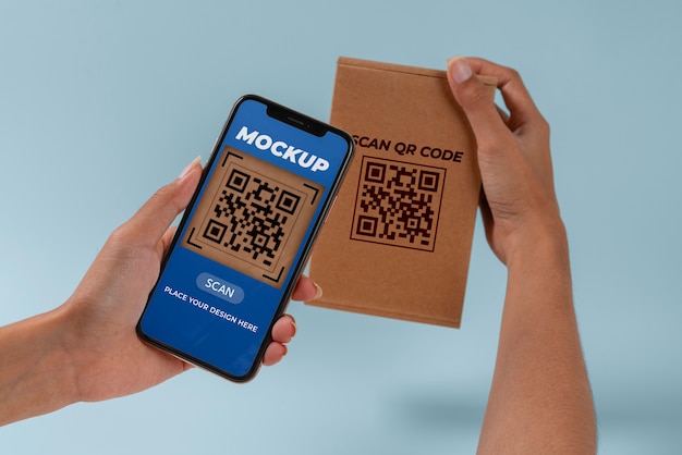 PSD person scanning qr code on cardboard box with smartphone