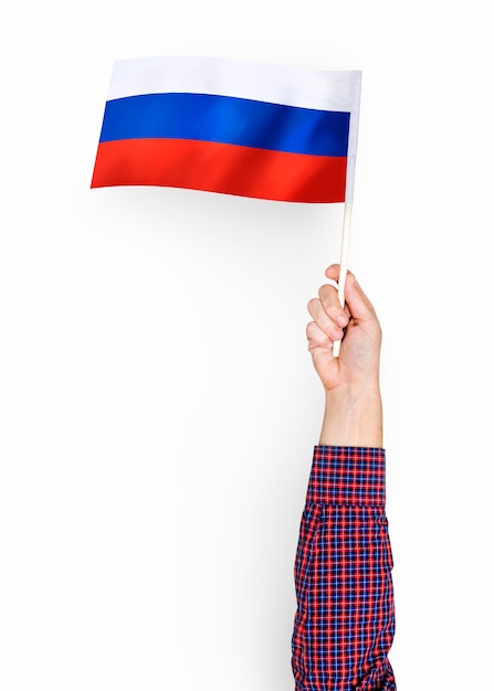 Person waving the flag of russian federation