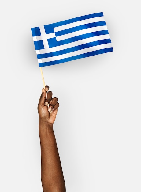 ギリシャの旗を振る人