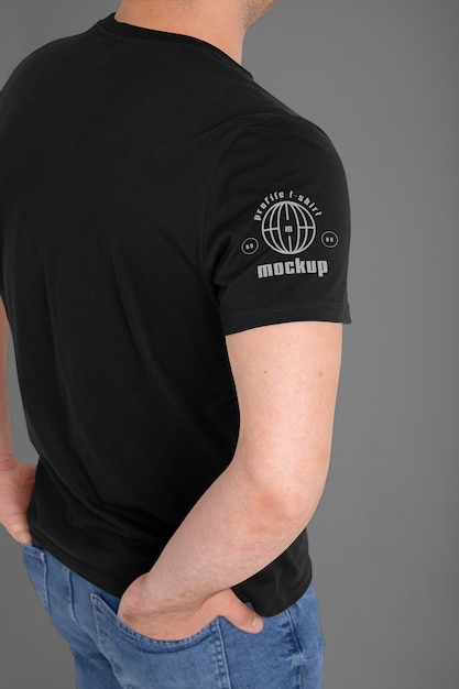 PSD person wearing t-shirt mock-up and showing side view