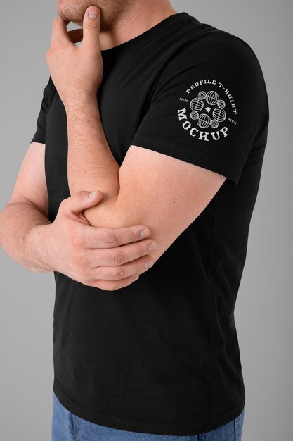 Person wearing t-shirt mock-up and showing side view