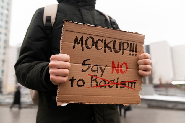 person with a material recycled signboard mockup