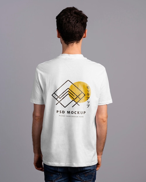 PSD person with tshirt mockup on his back