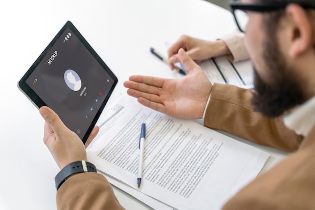 Person working remotely at a computer mockup