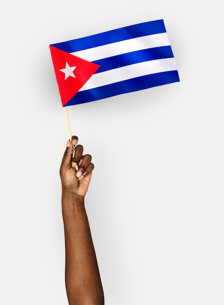 PSD persoon die de vlag van de republiek cuba zwaaien