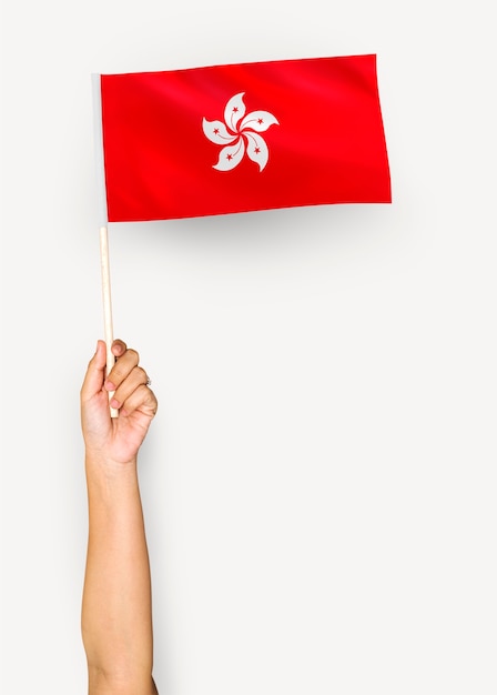 PSD persoon die de vlag van hong kong golft