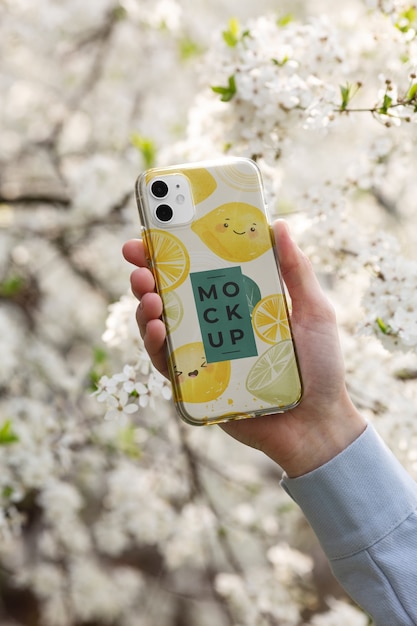 Phone case mockup held in hand