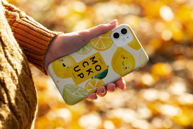 PSD phone case mockup held in hand