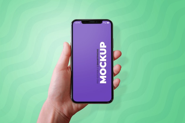 Phone in hand mockup