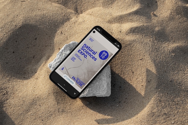 PSD phone mockup on the beach