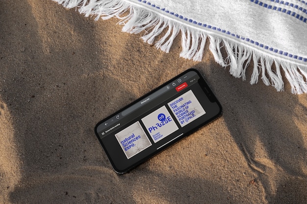 PSD phone mockup on the beach