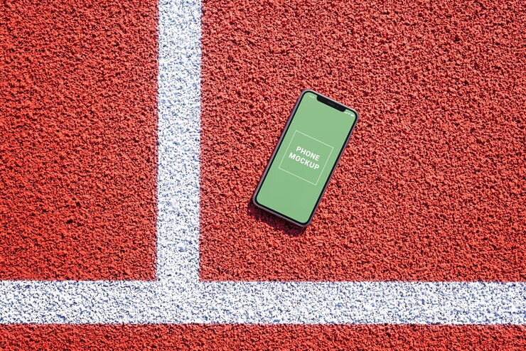 PSD phone mockup on running track