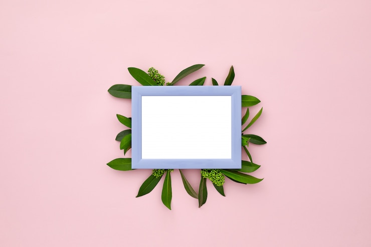PSD photo frame decorated with green leaves