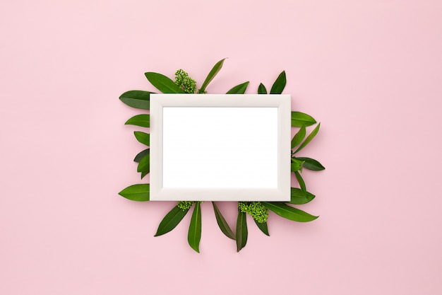 Photo frame decorated with green leaves