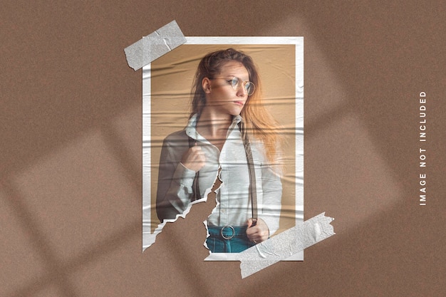 photo frame mockup on torn paper texture