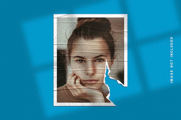 photo frame mockup on torn paper texture