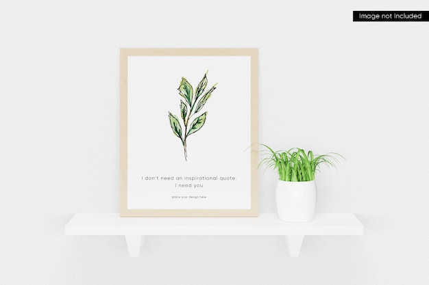 Photo frame mockup on the wall with plant