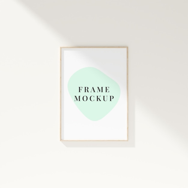 Photo frame mockup with empty space hanging on the wall