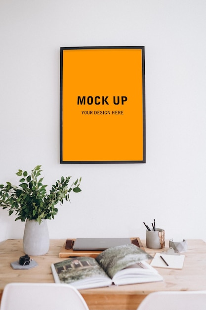 PSD photo frame mockup on workspace