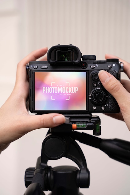 PSD photograph holding photo camera